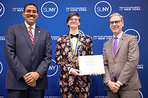 SUNY Chancellor John King, Victor Vyssotski '26 and President Steiper at the SUNY Chancellor's Award for Student Excellence ceremony.