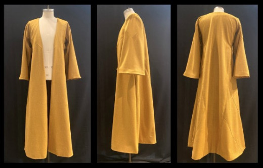 Gold Wool Robe fully lined with triangular insets, geometric seamed panels and top-stitching deta...
