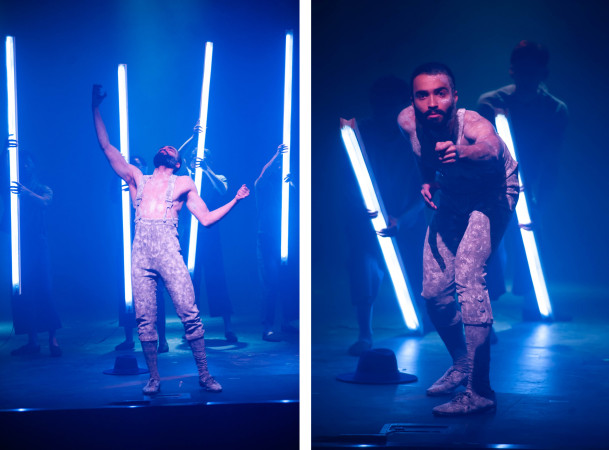 actor in grey speckled pants and suspenders