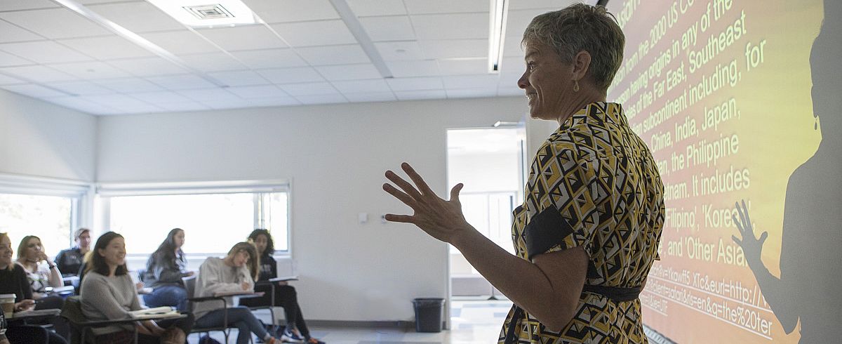 Professor Lisa Jean Moore teaches class.