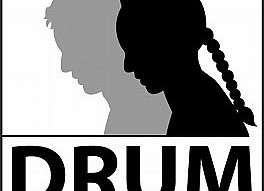 DRUM logo shadow of woman holding fist up
