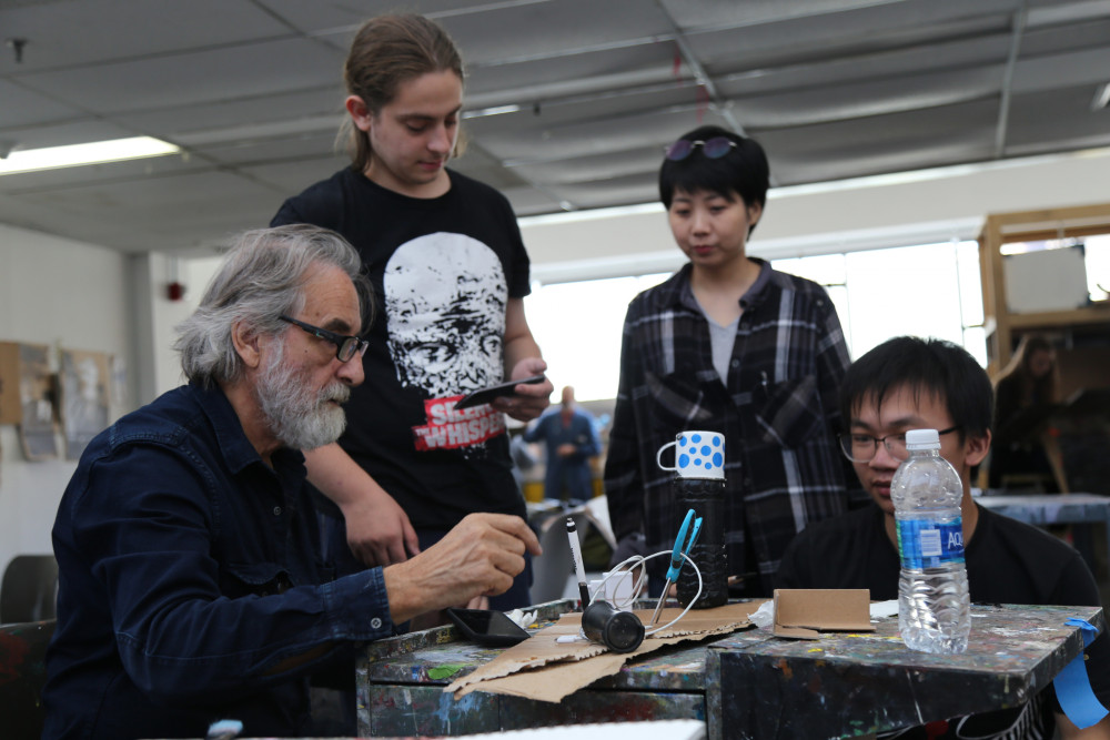 Artist in Residence Ignacio Iturria in the studio with students