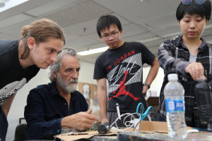 Artist in Residence Ignacio Iturria in the studio with students