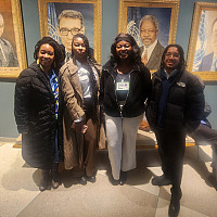 Global Black Studies Student in the UN in front of frames