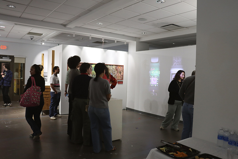 Viewers in the Passage Gallery New Media Senior Show