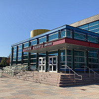 View of Library front steps and doors facing South
