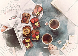 A student studies while enjoying a breakfast of tea, toast, fruit, and other snacks.