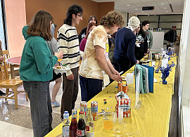 Participants tasting edible book creations.