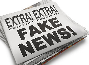 The front page of a newspaper with the headline Fake News