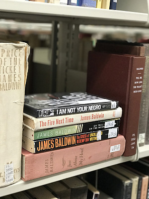 James Baldwin book stack