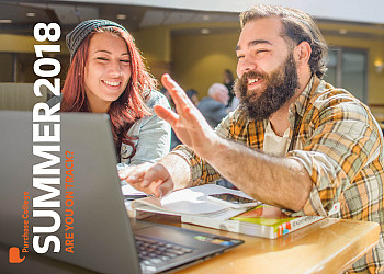 Students at laptop Purchase College Summer Session 2018. Are you on track?