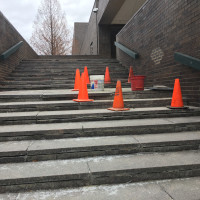 Image of existing PAC exterior stair in disrepair.