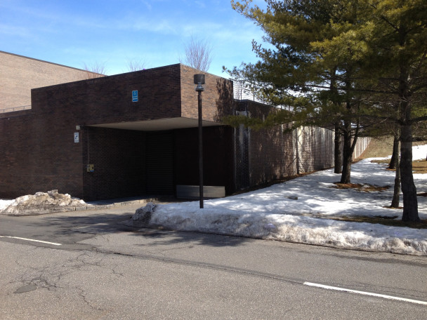 View of existing plaza corner from the West 1 parking lot.