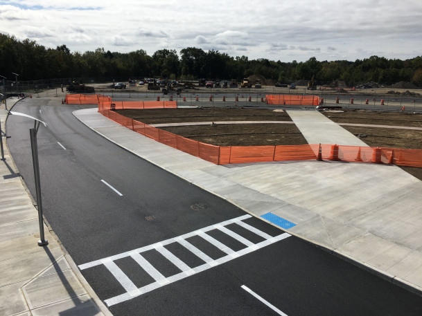 View of new concrete at West 1 pedestrian island.