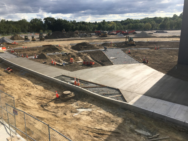 View of the West 1 roadway under construction and adjoining pedestrian island.