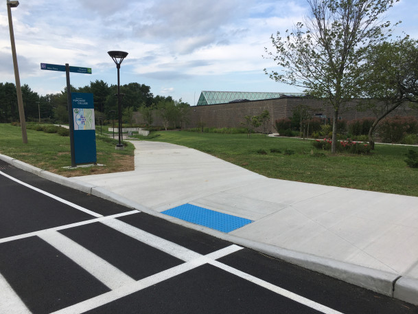 View of new new pathway connection at Gym and Pine Walk South.