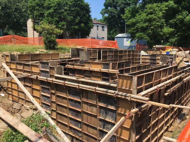 View of concrete formwork for new stairs & ramp near The Commons.