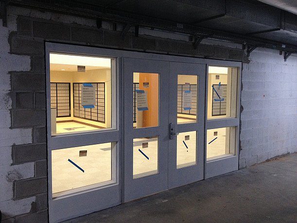 View of new Mailroom entrance doors being installed.