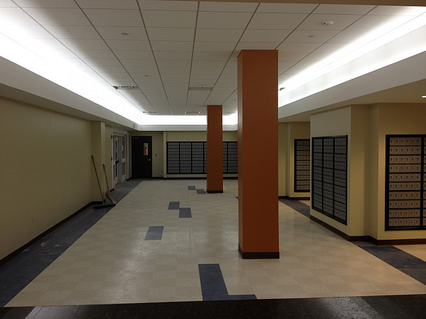 View from the service counter of the Mailroom lobby under construction.