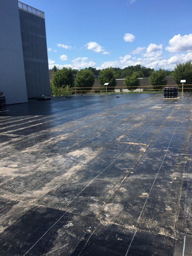 View of Bookstore roof under construction.