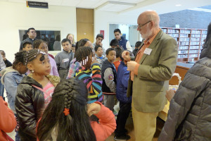 Director Patrick Callahan leads a tour of the Purchase Library