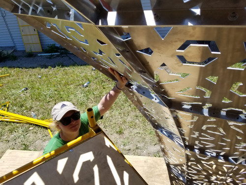 Student works on the American Riad project in Detroit