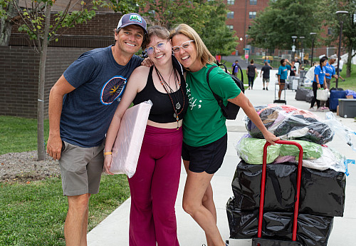 Smiling students and parents